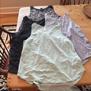Lululemon workout Tops - 4 in total. Size 8